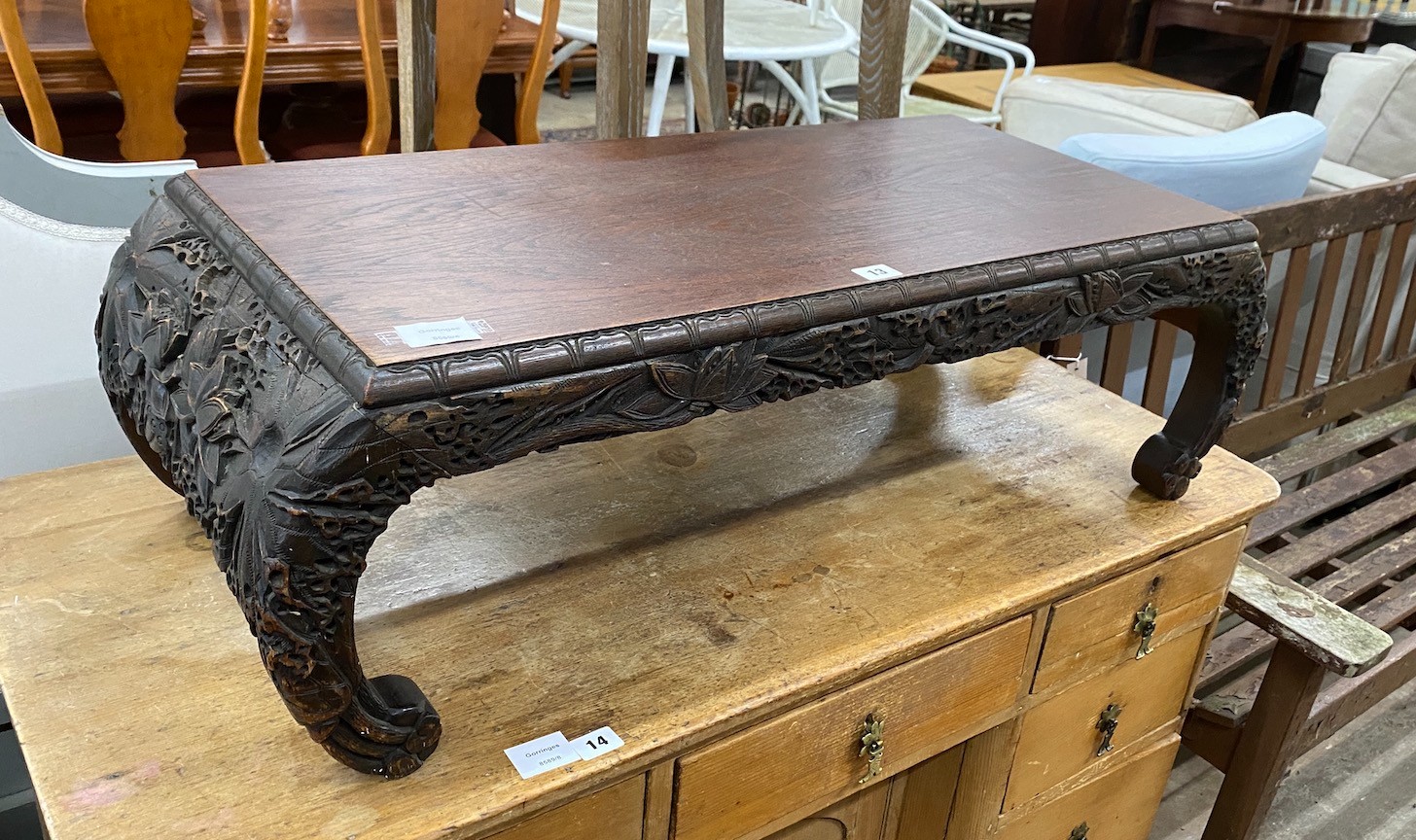 A Malaysian carved hardwood low table, width 92cm, depth 40cm, height 29cm